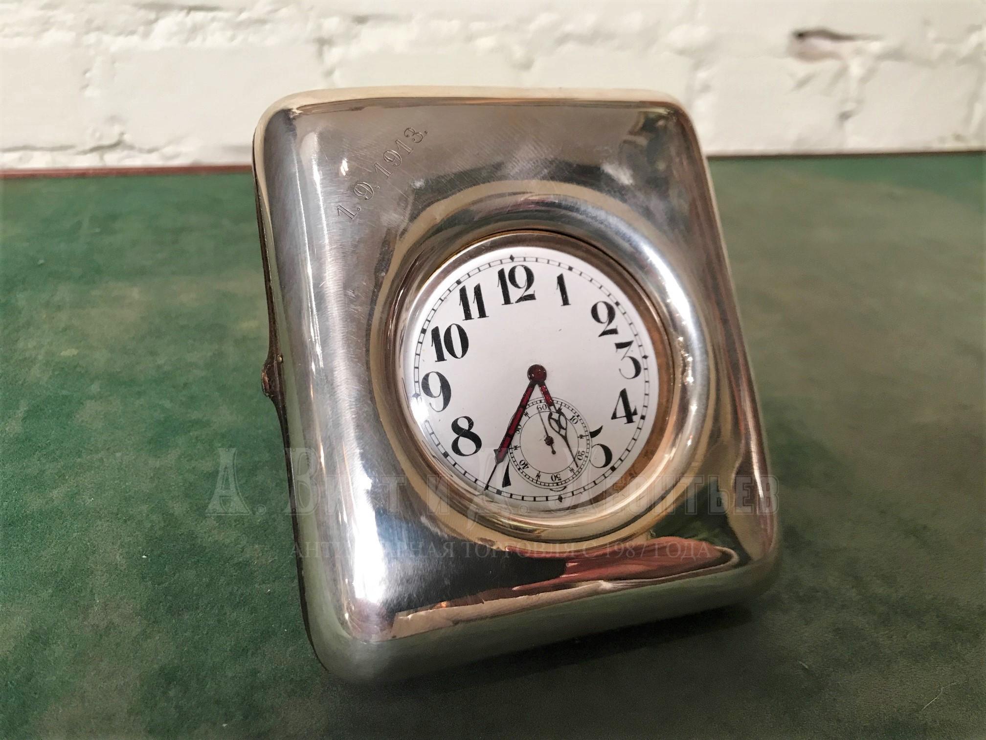 Настольные антикварные никелевые часы Gebruder Friedlaender в серебряном кофре